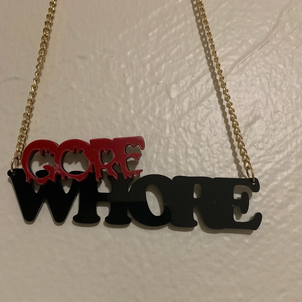 “Gore whore” chain necklace